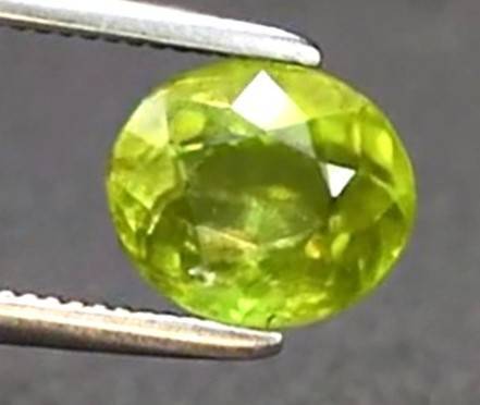 1.14ct Yellowish Green Sphene  Oval 6.5x5.7mm Natural Gemstone, Adamantine Luster