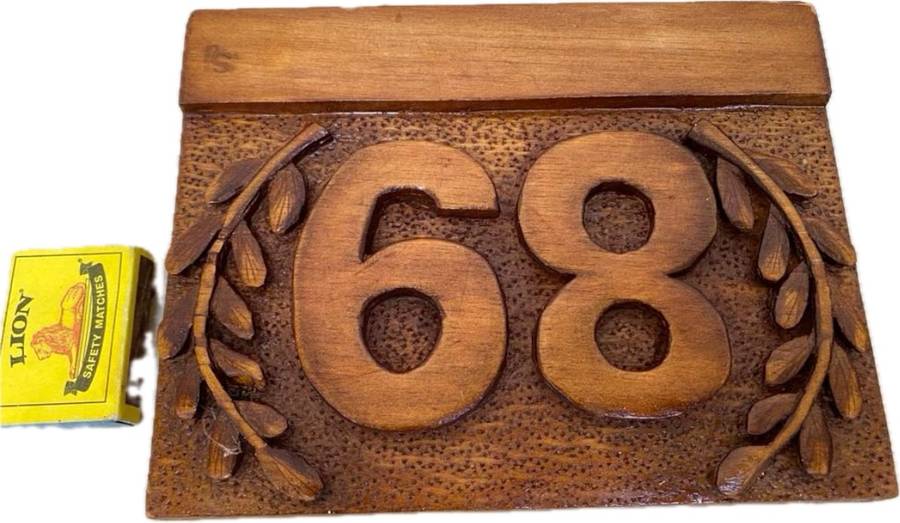 No 89 , no 68 wood carved no plaque