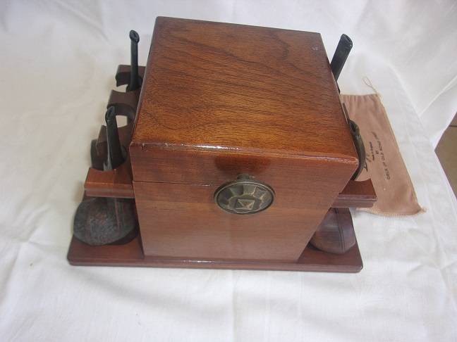 4 Vintage quality smoking pipes and a pipe stand for 1 bid
