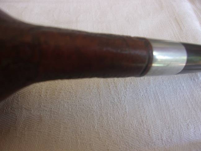 4 Vintage quality smoking pipes and a pipe stand for 1 bid