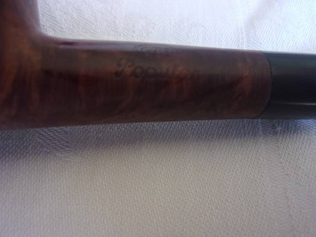 4 Vintage quality smoking pipes and a pipe stand for 1 bid