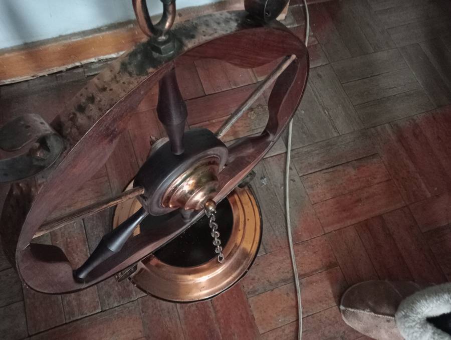 ANTIQUE  INTERESTING HANDMADE WOOD  WHEEL WITH COPPER TRIMMINGS AND COPPER  CHAINS STAND