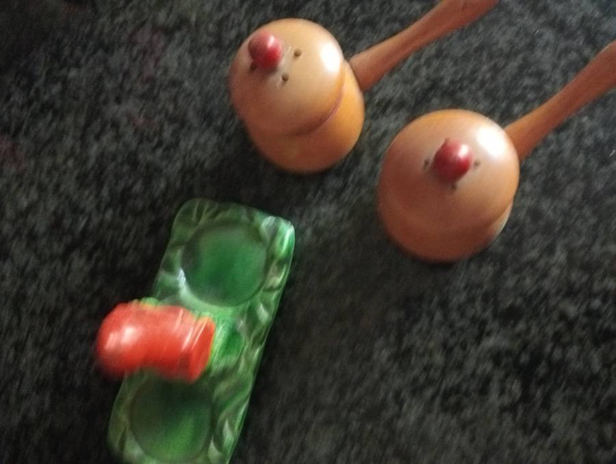 Vintage salt and pepper set in green tray