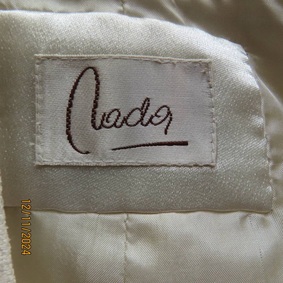 Amazing rich cream wool/poly sleeveless top/waistcoat by NADA Istanbul.Size 36. Brand new con