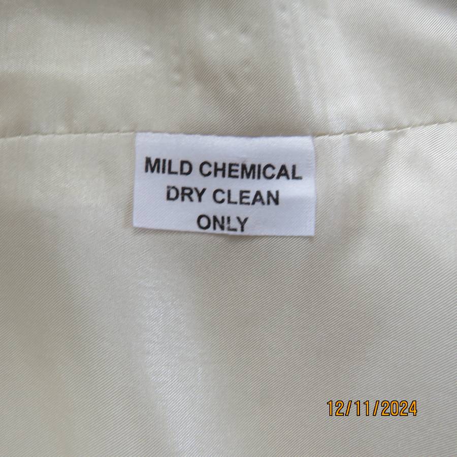 Amazing rich cream wool/poly sleeveless top/waistcoat by NADA Istanbul.Size 36. Brand new con