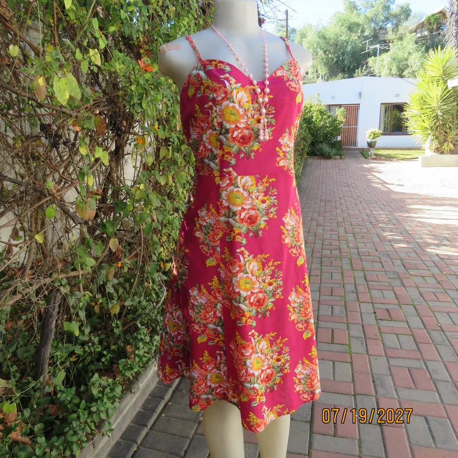 Magenta pink cotton strappy dress with yellow-peach posies. Size 38.