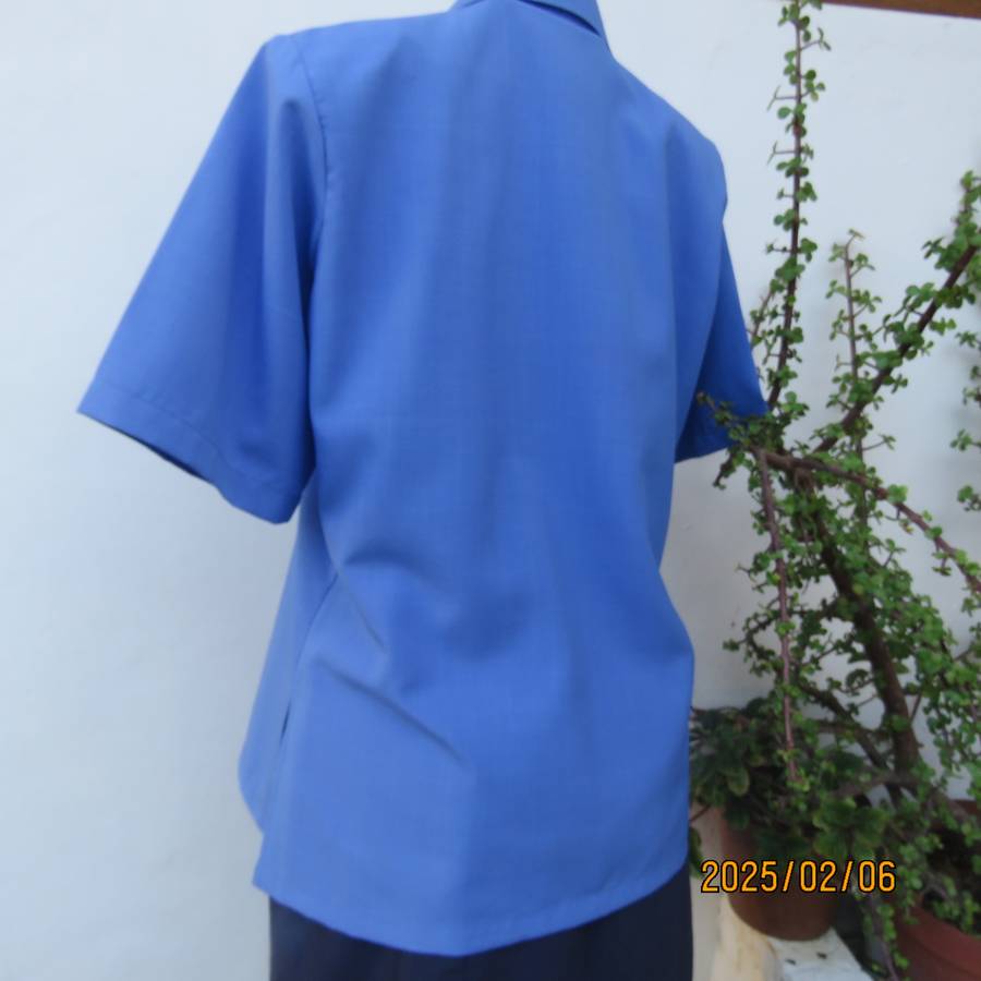 Fabulous true blue richly embroidered short sleeve polycotton top. Size 40-42. Double collar. As new
