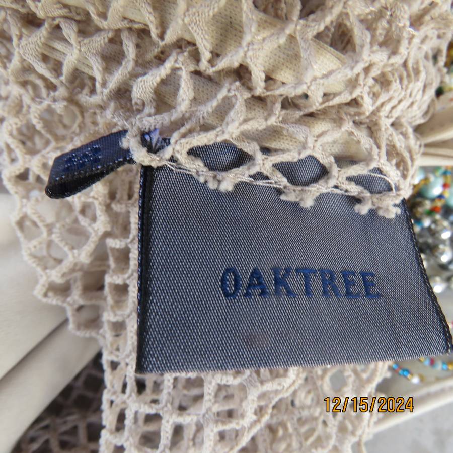 Charming 2 pc wheat colour top with cami and mesh overlayer.Size 36 by OAKTREE. Brand new cond