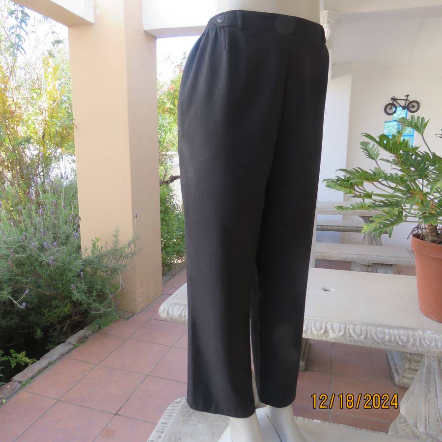 High quality black pants by Bhs from London size 40. In soft polyester. Waist back/sides elasticated
