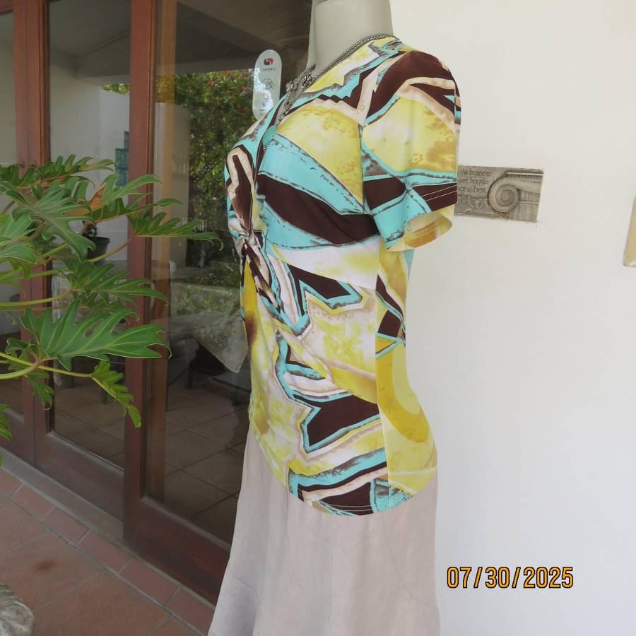 FASHION Express size 38 geometric printed V neck stretch top.