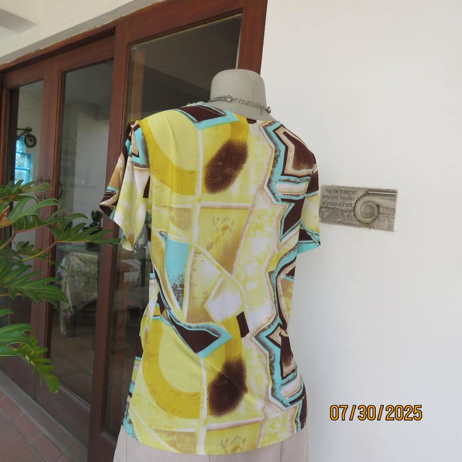 FASHION Express size 38 geometric printed V neck stretch top.