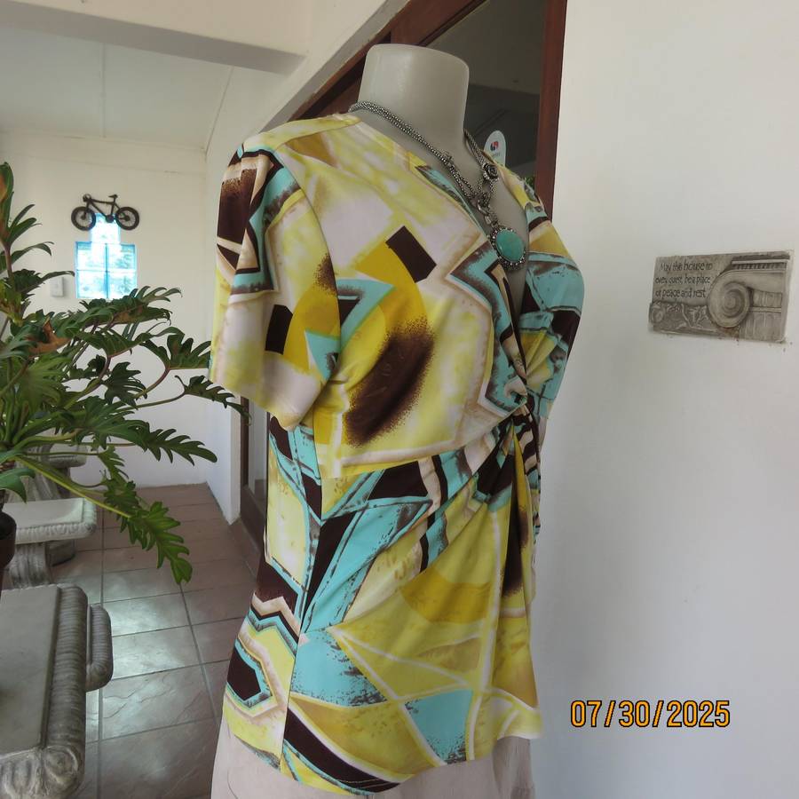FASHION Express size 38 geometric printed V neck stretch top.