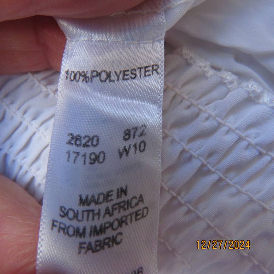 Nostalgic white crinkled polyester long sleeve blouson style top.Size 32 by TRUWORTHS.Double frill.
