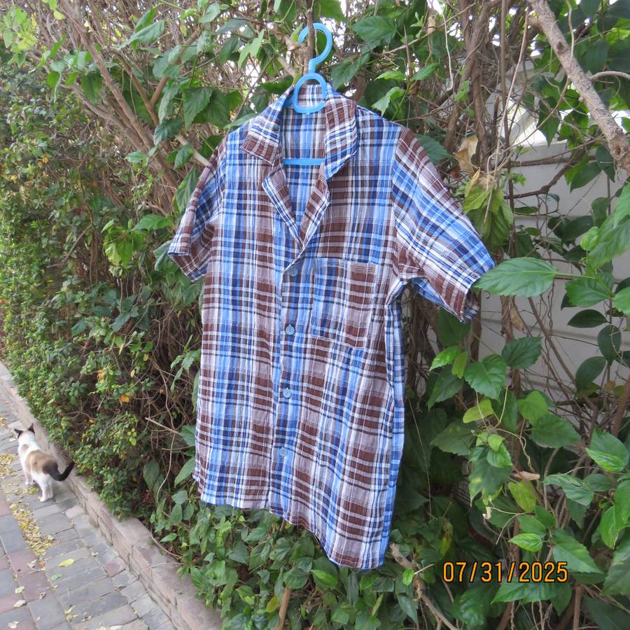 Men's blue and brown check short sleeve size small shirt in bubble poly-rayon.