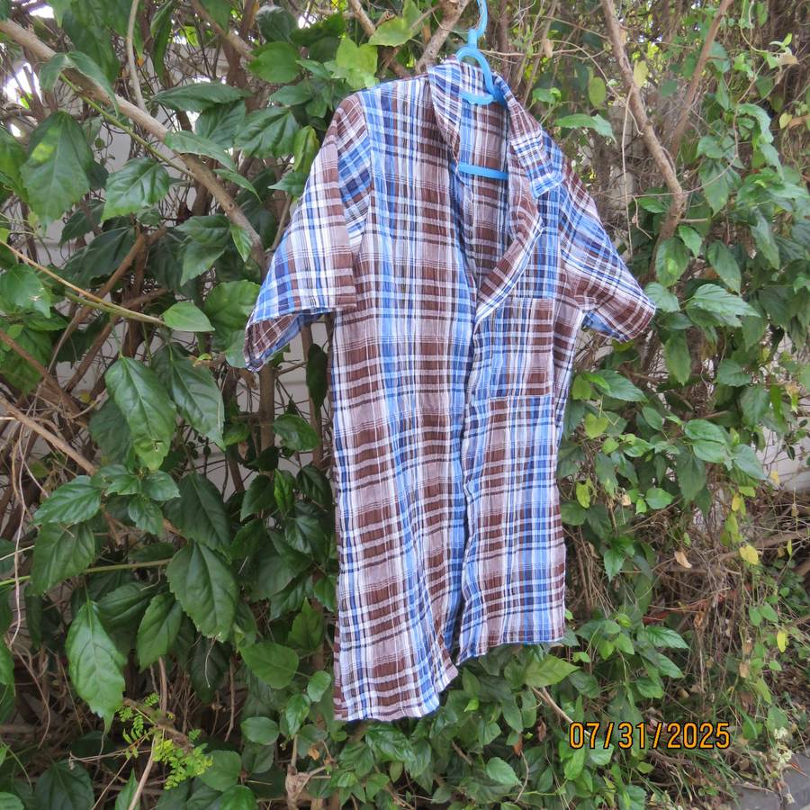 Men's blue and brown check short sleeve size small shirt in bubble poly-rayon.