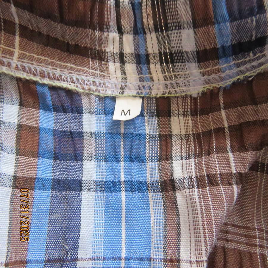 Men's blue and brown check short sleeve size small shirt in bubble poly-rayon.
