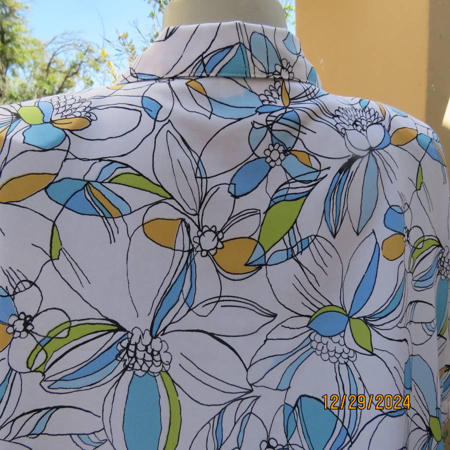 Beautiful CELLINI button down/open collar short sleeve top. Size 48/50.White/blue/peach floral.