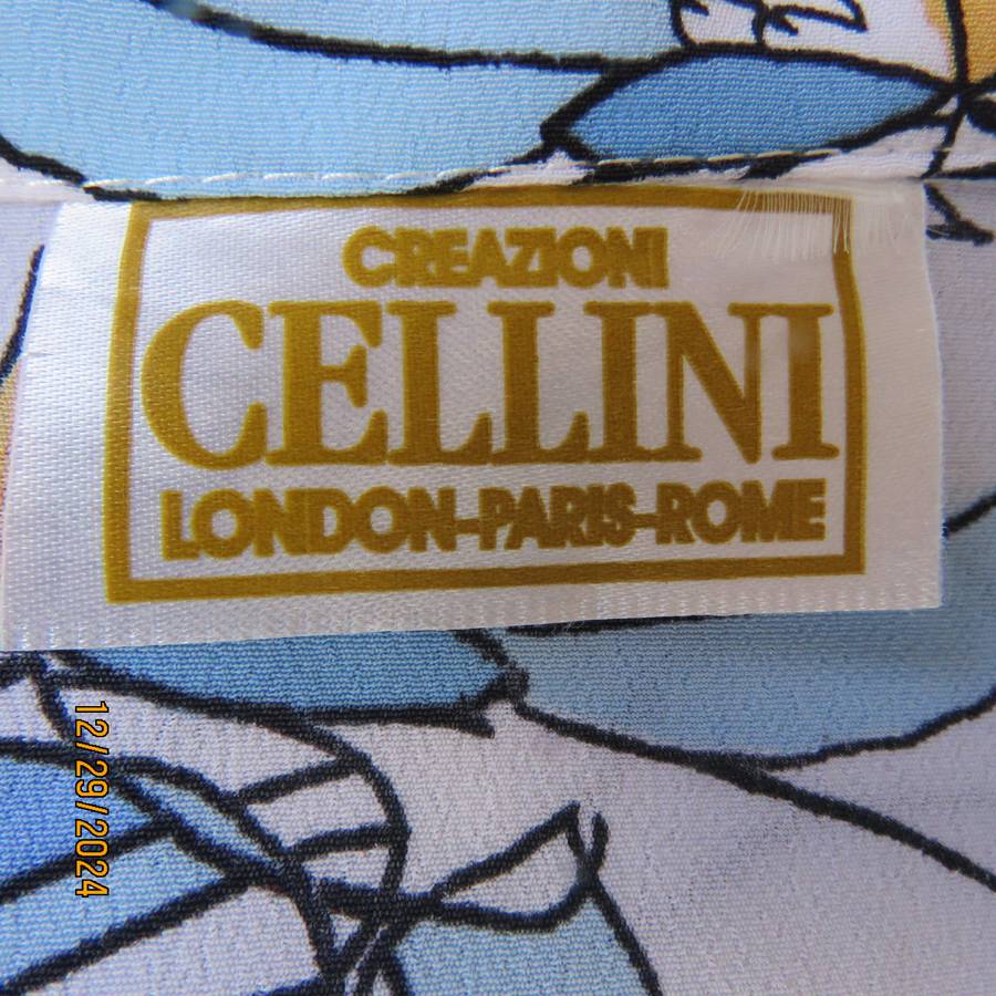 Beautiful CELLINI button down/open collar short sleeve top. Size 48/50.White/blue/peach floral.