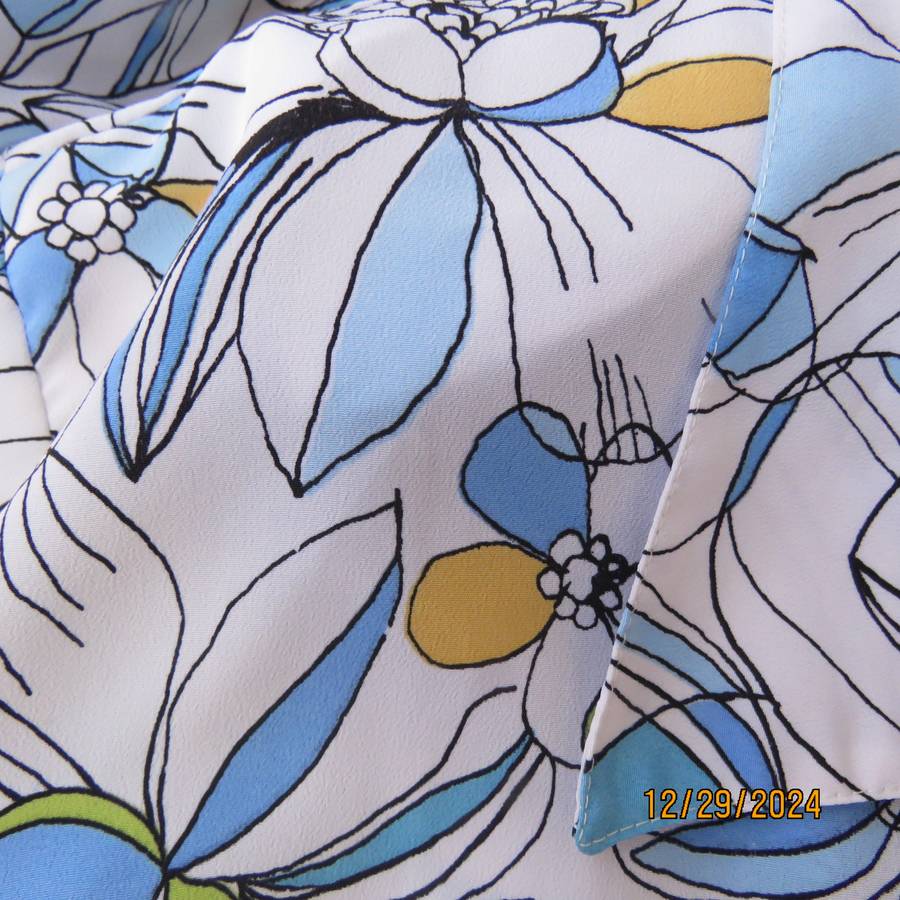 Beautiful CELLINI button down/open collar short sleeve top. Size 48/50.White/blue/peach floral.