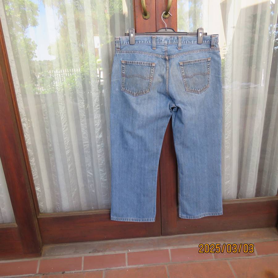 WOOLWORTHS pure cotton blue denim jeans size 38. Pockets back-front. Inner leg 74cm.