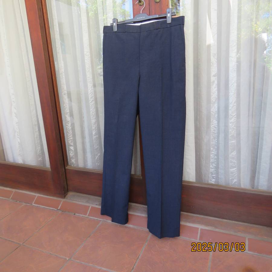 As new dark blue straight legged dress pants size 38 by ENSIGN Clothing. Side pockets. 1 at back.