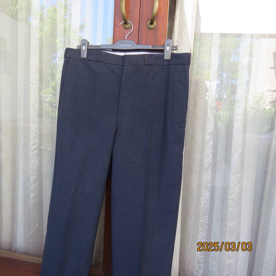 As new dark blue straight legged dress pants size 38 by ENSIGN Clothing. Side pockets. 1 at back.