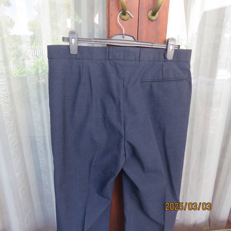 As new dark blue straight legged dress pants size 38 by ENSIGN Clothing. Side pockets. 1 at back.