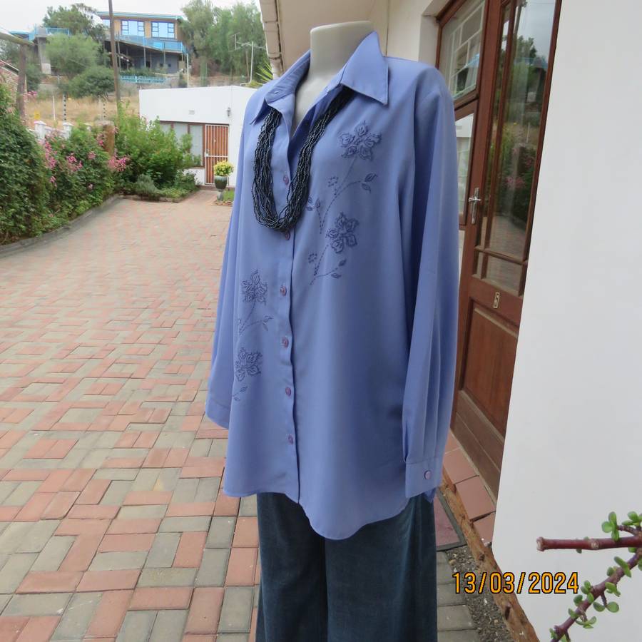 Steel blue richly embroidered long sleeve blouse by CG Collection New York. Size 42