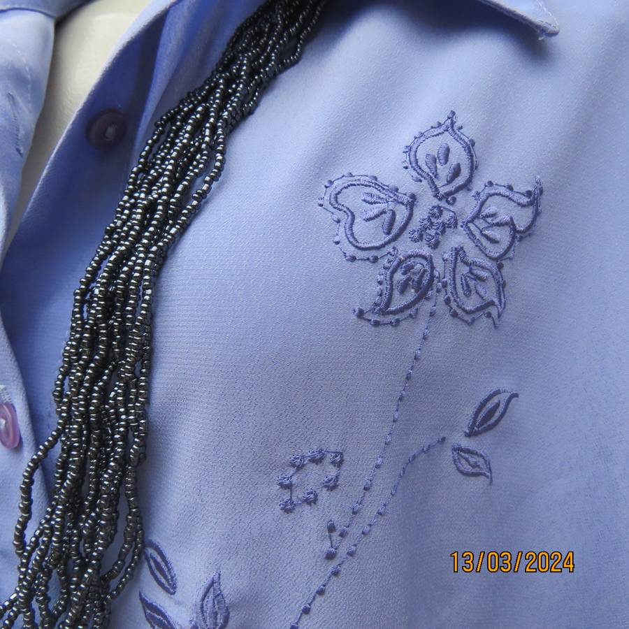 Steel blue richly embroidered long sleeve blouse by CG Collection New York. Size 42