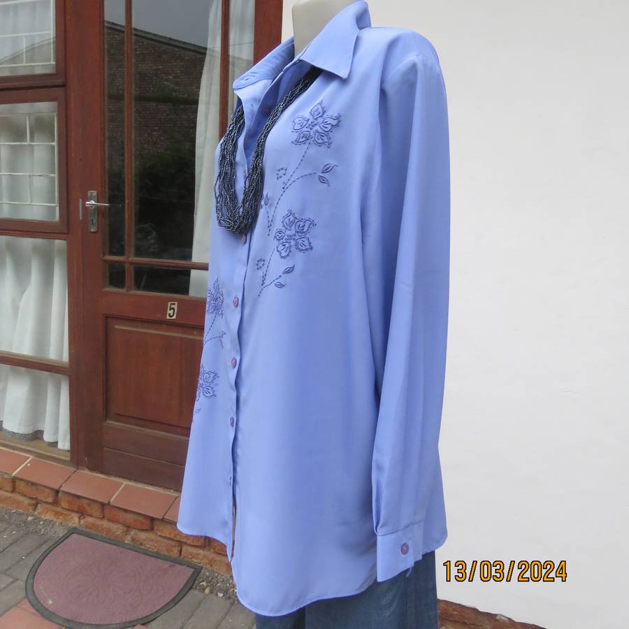 Steel blue richly embroidered long sleeve blouse by CG Collection New York. Size 42