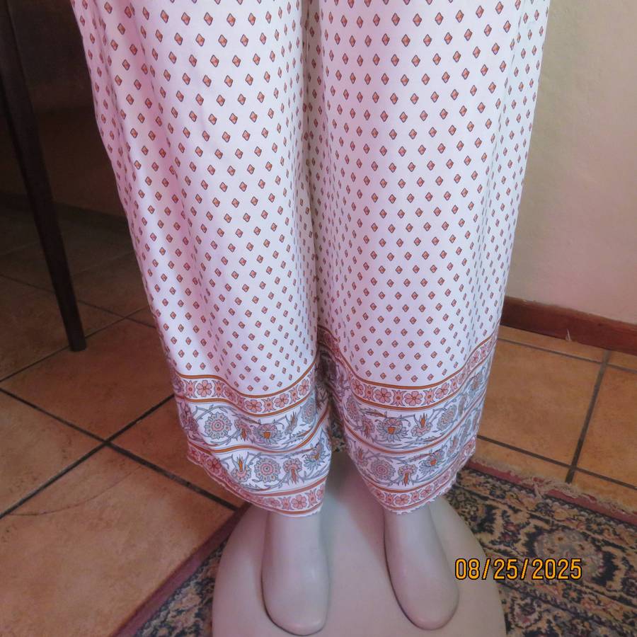 REAL Woman viscose wide legged cream pants with diamond pattern and border. Size 34