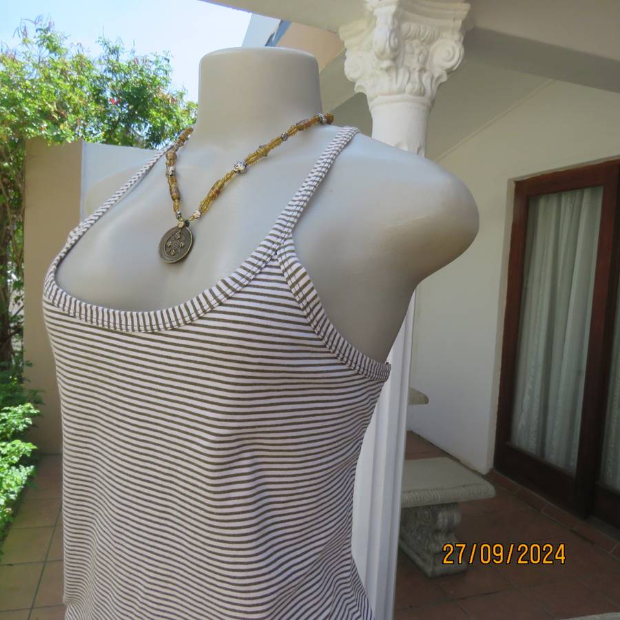 Casual strappy top in horizontal olivegreen-cream stripes. Size 38.Pretty back. Used but in good con