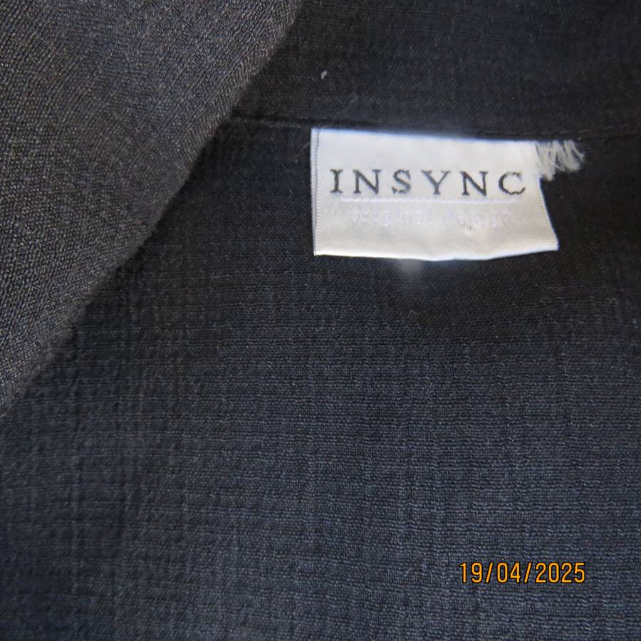 Black long sleeve textured polyester button down top size 42.