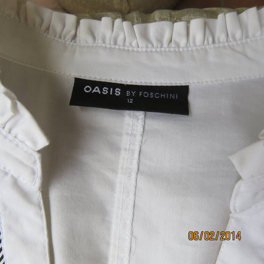 High quality white stretch polycotton OASIS long sleeve tailored top size 36. Sequin decoration.
