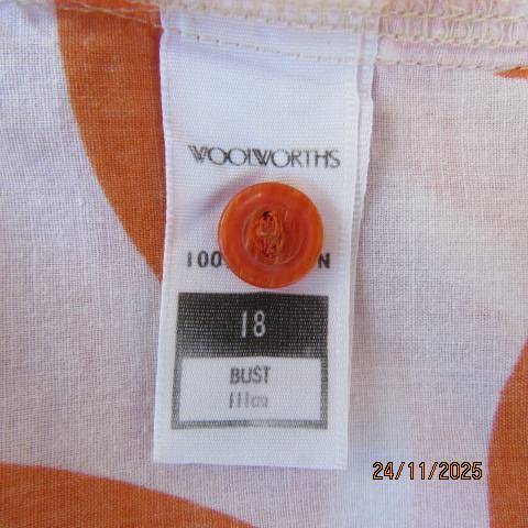 WOOLWORTHS white with orange bold graphic print slip over with long sleeves. Size 42