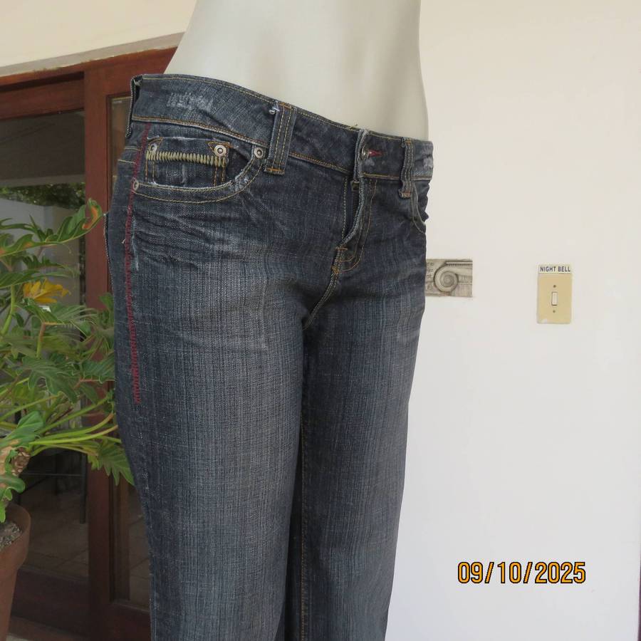 WOOLWORTHS dark blue denim low rise distressed look jeans size 35.