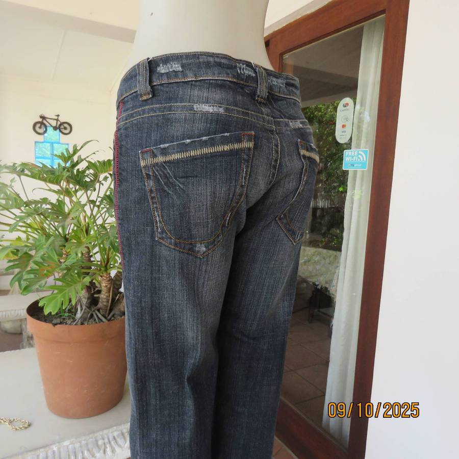 WOOLWORTHS dark blue denim low rise distressed look jeans size 35.