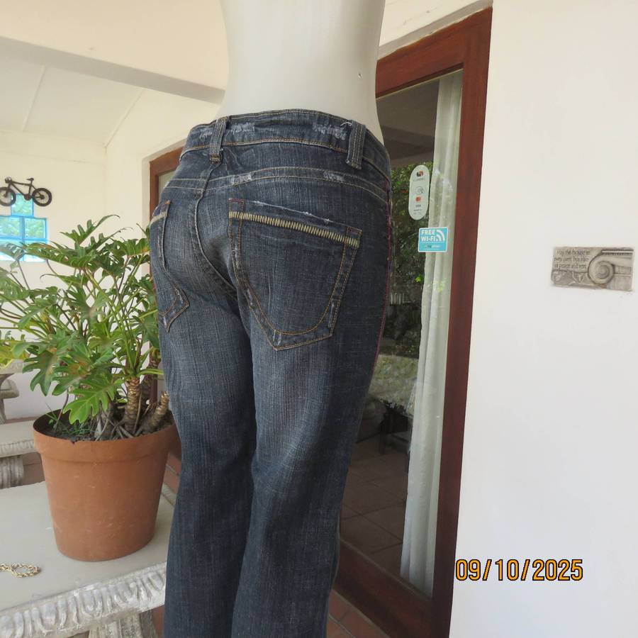 WOOLWORTHS dark blue denim low rise distressed look jeans size 35.