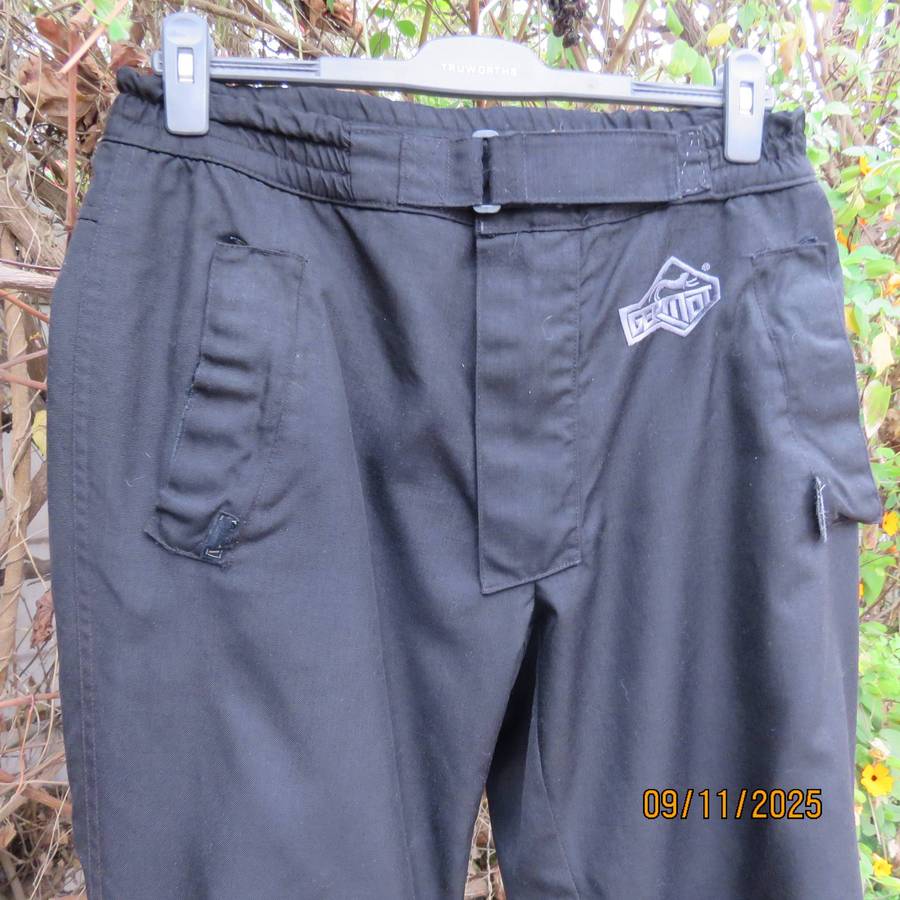 GERMOT black motorcycle water resistant pants size M. Velcro pockets. With wadding.