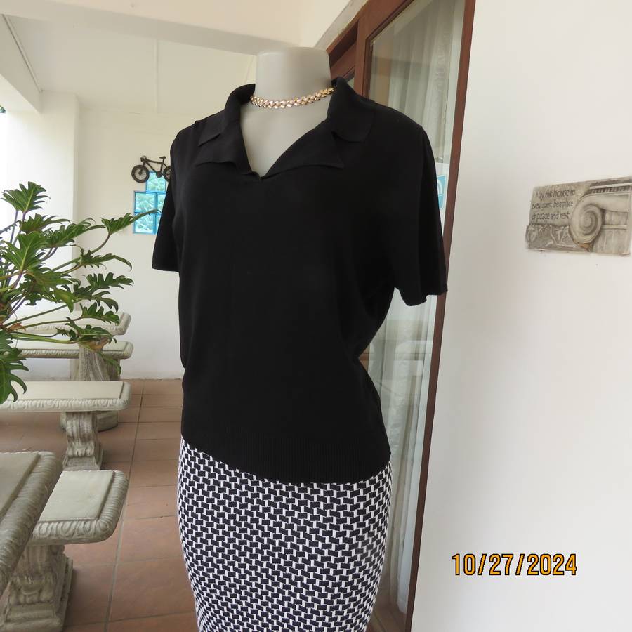 ANDRE BULLE imported black rayon-poliamida blend knitted golf style top. Size 38. As new