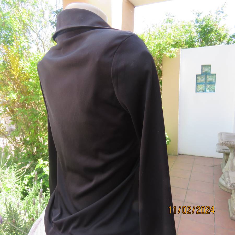 TRUWORTHS black long sleeve stretch polyester size 32 top. With braiding on the front.As new