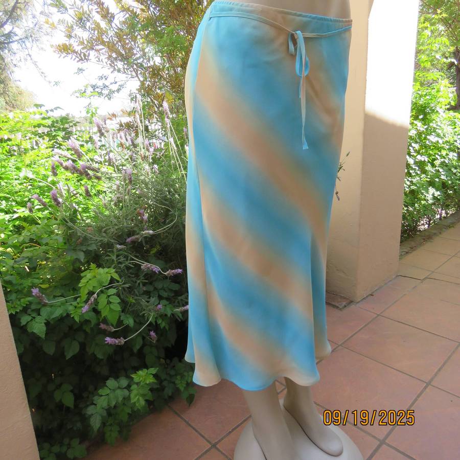 Skyblue-cream diagonal colour print sheer polyester midi lined skirt. Size 38