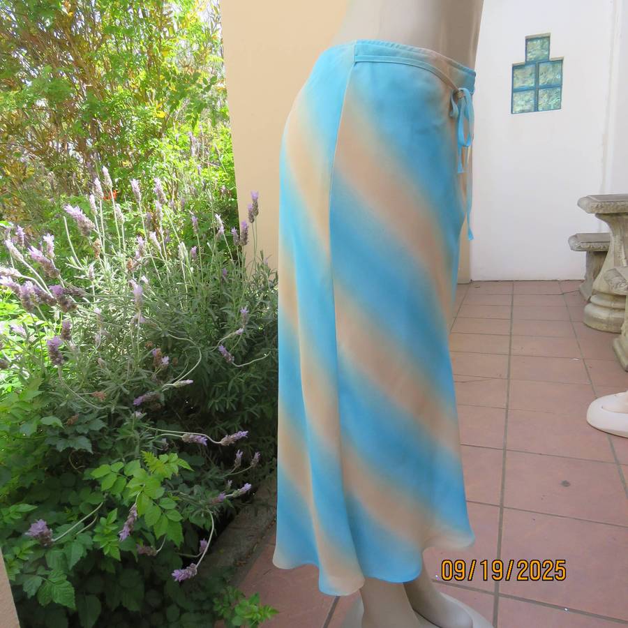 Skyblue-cream diagonal colour print sheer polyester midi lined skirt. Size 38
