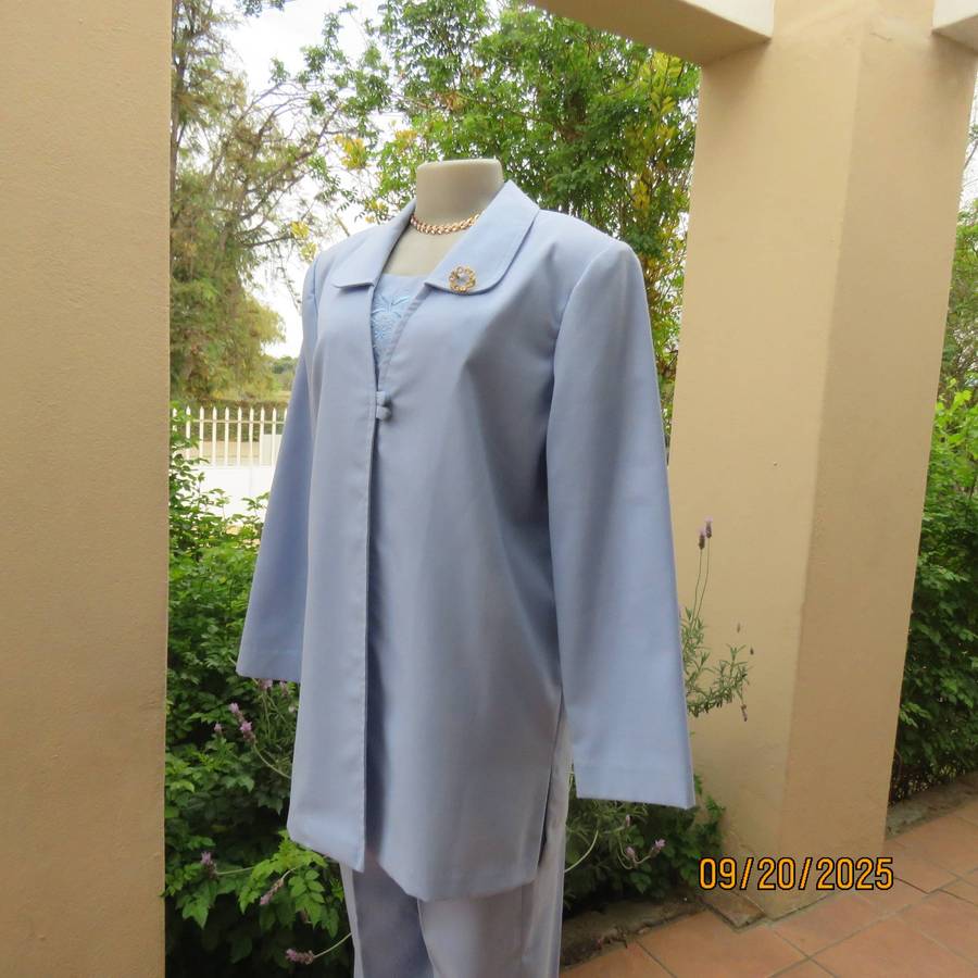 Boutique made 3 pc outfit in powder blue linen-polyester blend. Size 40.