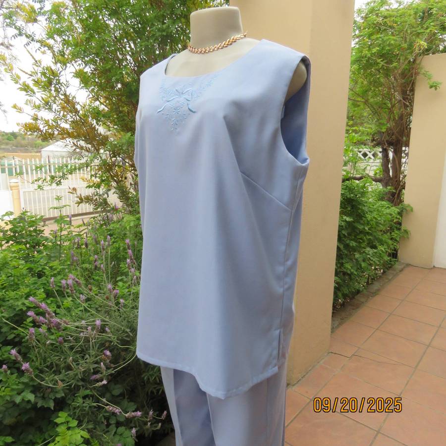 Boutique made 3 pc outfit in powder blue linen-polyester blend. Size 40.