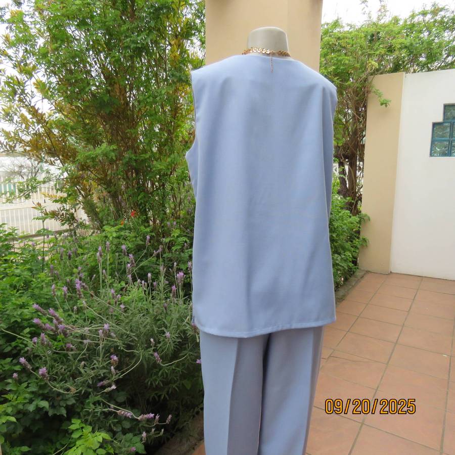 Boutique made 3 pc outfit in powder blue linen-polyester blend. Size 40.
