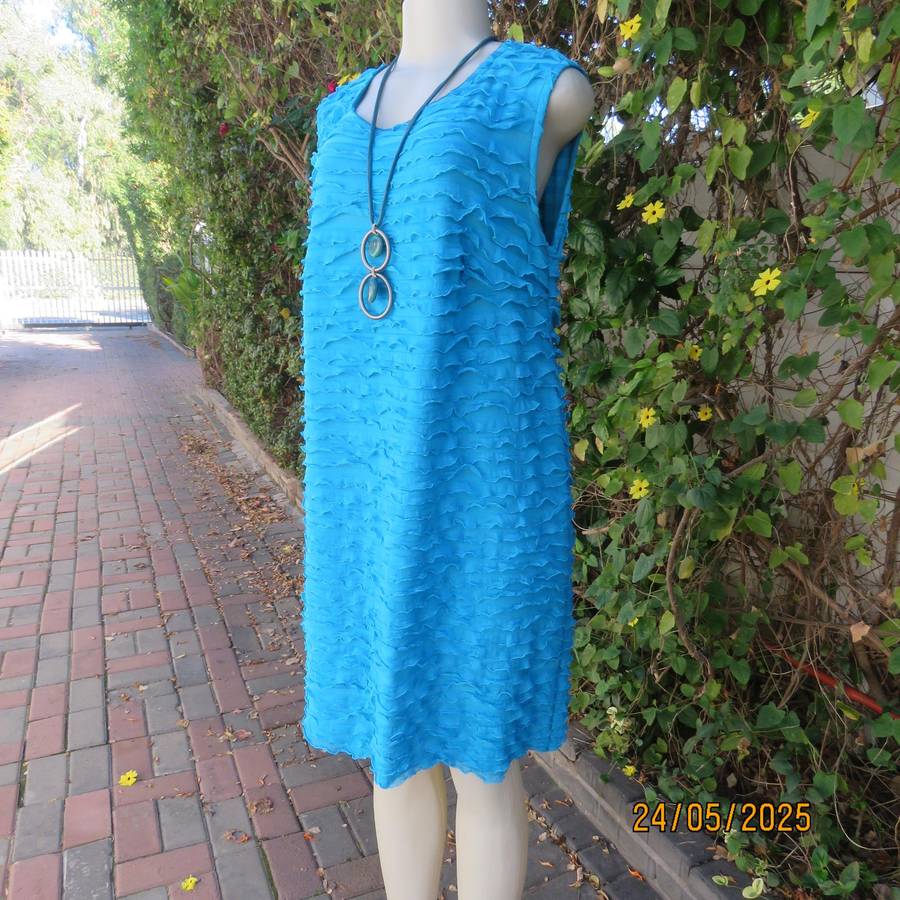 Jade colour sleeveless dress with sheer polyester coat. Boutique made size 40.
