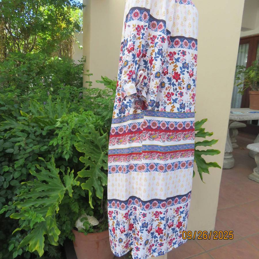 EXACT white viscose with blue-red flowers and horizontal lines. Size 42.