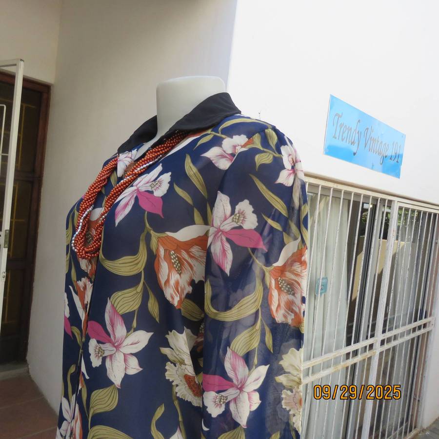 Navy sheer polyester button down top with rust-pink lilies. Black collar-cuffs. Size 36