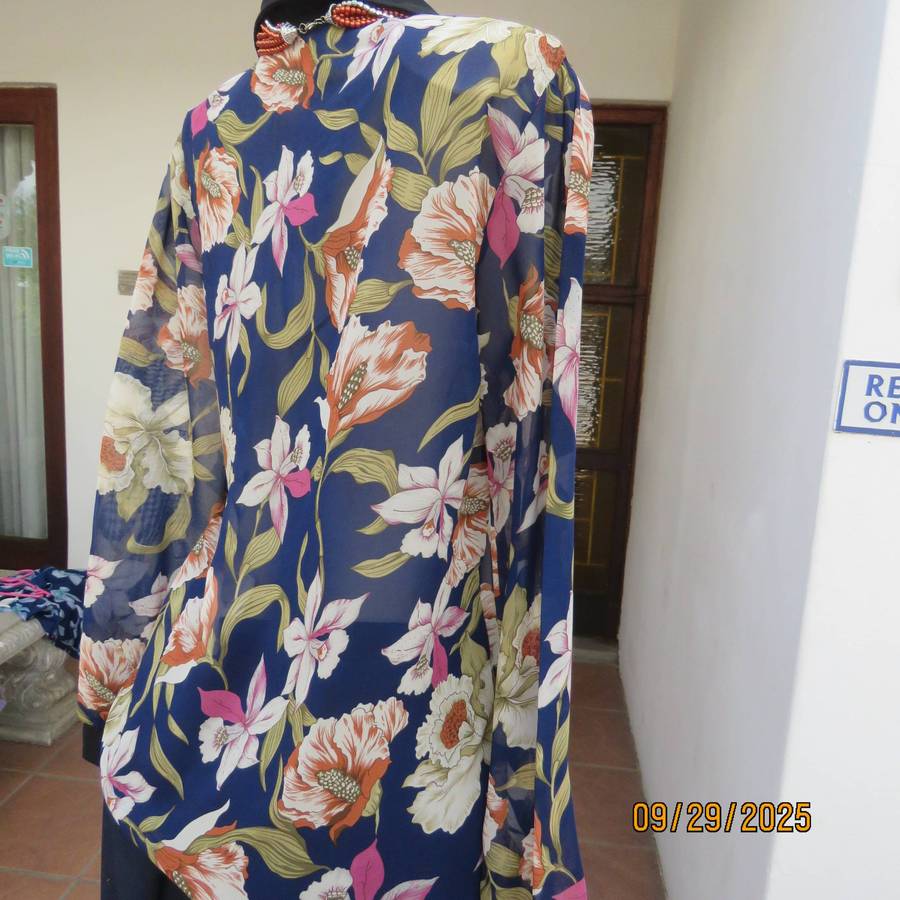 Navy sheer polyester button down top with rust-pink lilies. Black collar-cuffs. Size 36